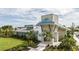 Stunning clubhouse featuring stone accents and lush landscaping creates a welcoming entrance at 5120 125Th E Ave, Parrish, FL 34219
