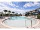 Community pool with a shallow section, poolside seating, and a covered lounge area for residents to enjoy at 5120 125Th E Ave, Parrish, FL 34219