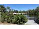 Wooden deck in backyard overlooking canal at 5813 Oxford Dr, Tampa, FL 33615