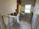 Bathroom showcasing a new toilet and shower area, prepped for renovation at 5813 Oxford Dr, Tampa, FL 33615