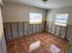 Bedroom featuring tile floor and natural light at 5813 Oxford Dr, Tampa, FL 33615