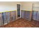 Bedroom featuring tile floor with closet and bathroom access at 5813 Oxford Dr, Tampa, FL 33615
