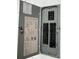 The open electrical panel shows a diagram of the interior wiring at 5813 Oxford Dr, Tampa, FL 33615