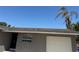 Charming one-story home with a well-maintained lawn and an attached garage at 5813 Oxford Dr, Tampa, FL 33615