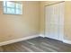 Cozy bedroom with a closet and durable flooring at 7425 W Maryland W Ave, Hudson, FL 34667