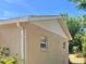 This home's exterior includes white gutters and trim at 7425 W Maryland W Ave, Hudson, FL 34667