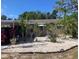 Charming single-story home with a carport and mature landscaping at 7425 W Maryland W Ave, Hudson, FL 34667