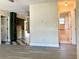 Open-concept living area leads to kitchen and bathroom at 7425 W Maryland W Ave, Hudson, FL 34667