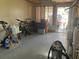 View of a storage space, and a car through the door at 7425 W Maryland W Ave, Hudson, FL 34667