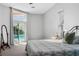 Spacious main bedroom with access to the backyard pool area at 7533 Dunbridge Dr, Odessa, FL 33556