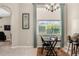 Home office space with a large window and natural light at 7533 Dunbridge Dr, Odessa, FL 33556