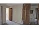 Bathroom view with studs exposed, and a view into the next room at 7896 42Nd N Ave, St Petersburg, FL 33709