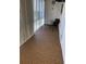 Relaxing balcony with tiled floor, vertical blinds, and a small table and chairs at 8055 112Th St # 406, Seminole, FL 33772