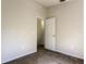 This bedroom features neutral walls, carpet flooring and a door leading to another room at 8110 Pond Shadow Ln, Tampa, FL 33635