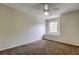 Bedroom featuring neutral walls, carpet and a ceiling fan at 8110 Pond Shadow Ln, Tampa, FL 33635
