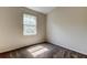 This bedroom features carpet flooring, neutral walls and a bright window at 8110 Pond Shadow Ln, Tampa, FL 33635
