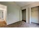 Neutral bedroom with closet and wall to wall carpeting at 8110 Pond Shadow Ln, Tampa, FL 33635