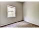 This bedroom features carpet flooring, neutral walls, and a bright window at 8110 Pond Shadow Ln, Tampa, FL 33635