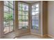 Cozy breakfast nook featuring tile floors, large windows and natural light at 8110 Pond Shadow Ln, Tampa, FL 33635