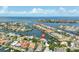 Aerial view of waterfront community with private boat docks at 915 Symphony Isles Blvd, Apollo Beach, FL 33572