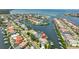 Stunning aerial view of waterfront property with boat docks and Gulf access in a beautiful coastal community at 915 Symphony Isles Blvd, Apollo Beach, FL 33572