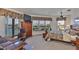 Bedroom features a water view, TV, ceiling fan and office at 915 Symphony Isles Blvd, Apollo Beach, FL 33572