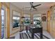 Bright game room with a foosball table and stunning water views at 915 Symphony Isles Blvd, Apollo Beach, FL 33572