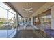 Spacious screened lanai with outdoor seating and a view of the canal at 915 Symphony Isles Blvd, Apollo Beach, FL 33572