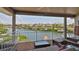 Covered patio with outdoor seating and beautiful water views at 915 Symphony Isles Blvd, Apollo Beach, FL 33572