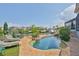 Inviting pool with lush landscaping and waterfront access at 915 Symphony Isles Blvd, Apollo Beach, FL 33572