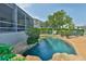 Lush pool area, creating a serene and inviting atmosphere at 915 Symphony Isles Blvd, Apollo Beach, FL 33572