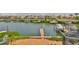 Waterfront community homes each with private docks and ample navigable waterway access to the bay and Gulf at 915 Symphony Isles Blvd, Apollo Beach, FL 33572