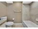 Bathroom with a toilet, combination shower and bathtub, and vanity counter at 10435 Tassel St, Spring Hill, FL 34608