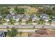 The tidy neighborhood displays neat rows of homes, enhanced by mature trees and carefully tended yards at 10625 Cardera Dr, Riverview, FL 33578