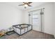 Bedroom with neutral walls, standard window, and play area set up at 10625 Cardera Dr, Riverview, FL 33578