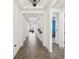 Bright hallway featuring high ceilings, recessed lighting and views to the living spaces at 10625 Cardera Dr, Riverview, FL 33578