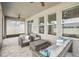 Covered patio includes comfortable seating and stylish decor, great for relaxing and entertaining outdoors at 10625 Cardera Dr, Riverview, FL 33578