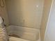 Bathroom featuring a shower and tub combination with basic tiling at 11201 122Nd Ave # 126, Largo, FL 33778