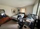 Bright bedroom with a comfortable bed, desk and sitting area with a large window letting in natural light at 11201 122Nd Ave # 126, Largo, FL 33778