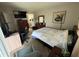 Bedroom featuring a computer desk, and a closet that leads to the bathroom at 11201 122Nd Ave # 126, Largo, FL 33778