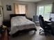 Comfortable bedroom offering ample natural light and tranquil outdoor views at 11201 122Nd Ave # 126, Largo, FL 33778