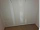 A simple empty closet with painted walls and carpet flooring at 11201 122Nd Ave # 126, Largo, FL 33778