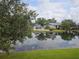Scenic view of pond and community pool, creating a tranquil setting for these apartment homes at 11201 122Nd Ave # 126, Largo, FL 33778
