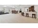 Finished basement boasts a stylish bar, lounge, workout area, and plenty of space for entertaining at 11624 Calf Path Dr, Tampa, FL 33626