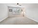 Spacious bedroom with two windows, neutral carpet, and ample natural light at 11624 Calf Path Dr, Tampa, FL 33626