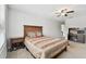 Bedroom with ceiling fan, plush carpeting, and furnishings at 11624 Calf Path Dr, Tampa, FL 33626