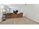 Living room area has comfortable seating, large TV, soft carpet and modern fixtures at 11624 Calf Path Dr, Tampa, FL 33626