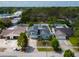 A beautiful home has great curb appeal in a desirable neighborhood, as shown in the overhead aerial view at 12913 126Th Ter, Largo, FL 33774