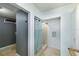 Shower in tiled bathroom with a shower curtain at 12913 126Th Ter, Largo, FL 33774