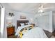 Bright bedroom with a unique ram's head decoration, soft rug, and ample natural light at 12913 126Th Ter, Largo, FL 33774